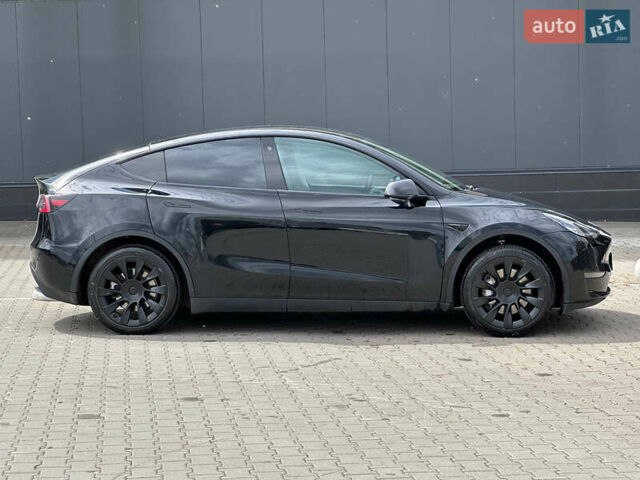 Черный Тесла Model Y, объемом двигателя 0 л и пробегом 49 тыс. км за 19900 $, фото 9 на Automoto.ua