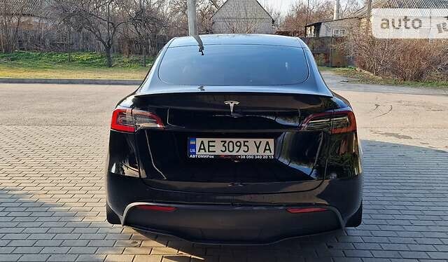 Черный Тесла Model Y, объемом двигателя 0 л и пробегом 26 тыс. км за 50950 $, фото 4 на Automoto.ua