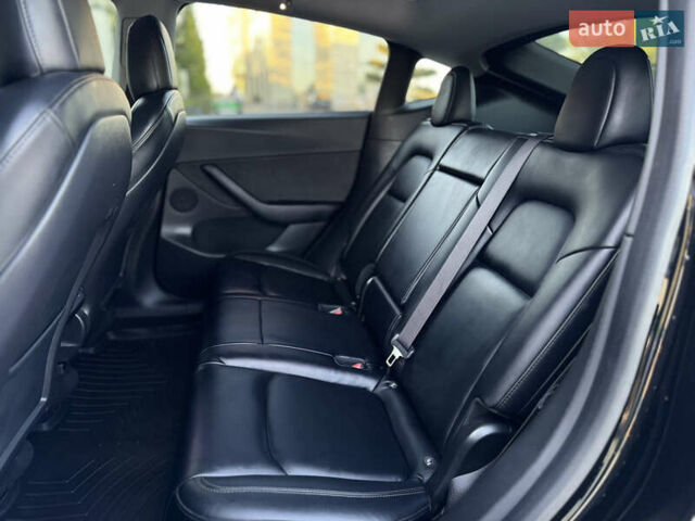 Чорний Тесла Model Y, об'ємом двигуна 0 л та пробігом 110 тис. км за 22799 $, фото 65 на Automoto.ua