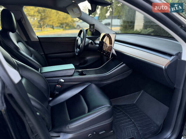 Чорний Тесла Model Y, об'ємом двигуна 0 л та пробігом 110 тис. км за 22799 $, фото 37 на Automoto.ua