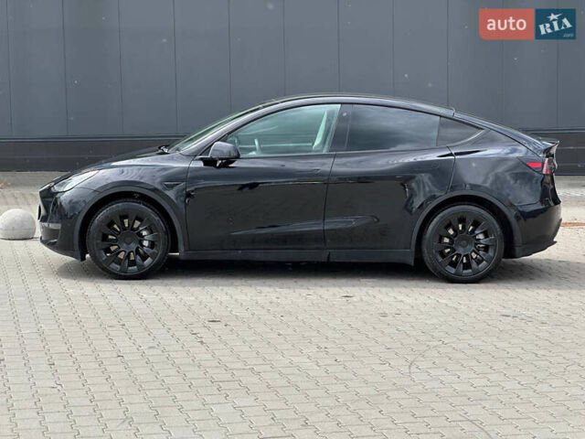Черный Тесла Model Y, объемом двигателя 0 л и пробегом 49 тыс. км за 19900 $, фото 5 на Automoto.ua
