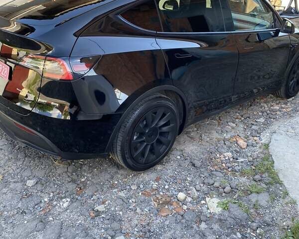 Чорний Тесла Model Y, об'ємом двигуна 0 л та пробігом 72 тис. км за 24399 $, фото 5 на Automoto.ua