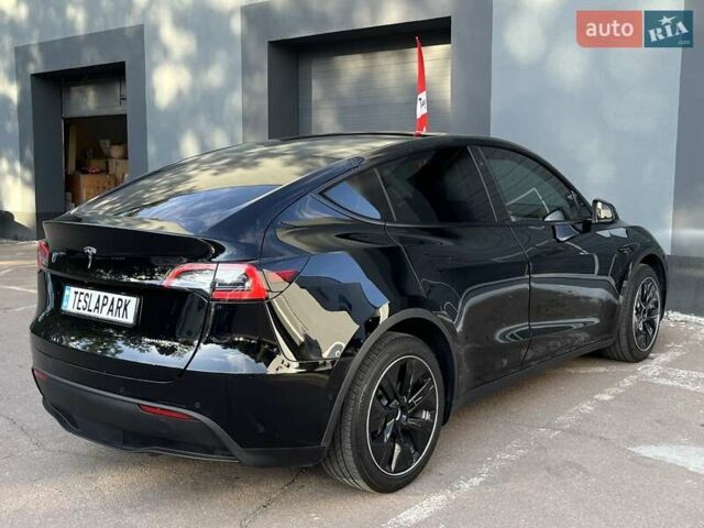 Черный Тесла Model Y, объемом двигателя 0 л и пробегом 136 тыс. км за 24999 $, фото 8 на Automoto.ua