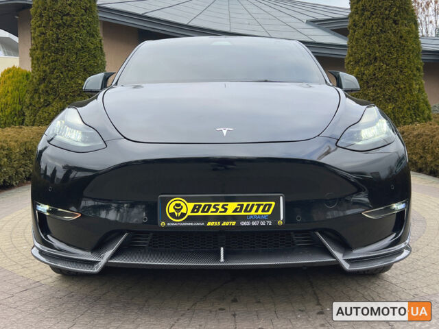 Черный Тесла Model Y, объемом двигателя 75 л и пробегом 72 тыс. км за 29800 $, фото 1 на Automoto.ua
