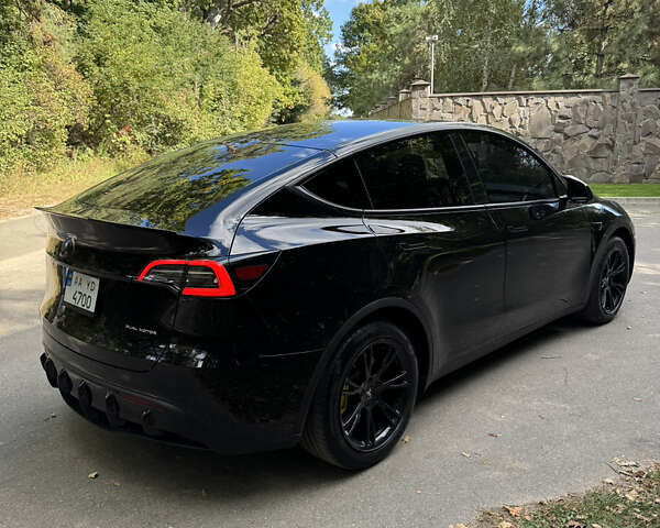 Черный Тесла Model Y, объемом двигателя 0 л и пробегом 143 тыс. км за 22900 $, фото 2 на Automoto.ua