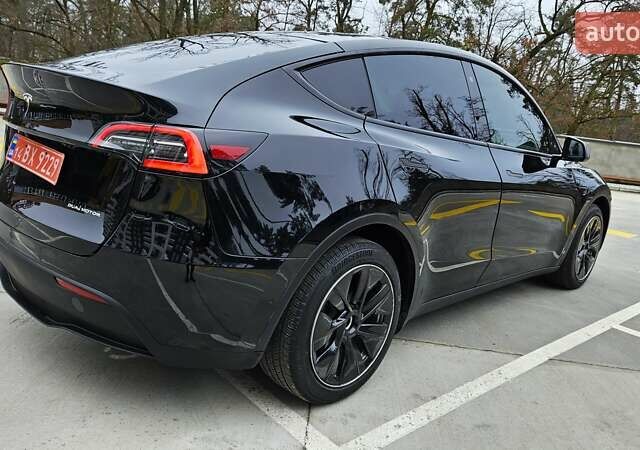 Черный Тесла Model Y, объемом двигателя 0 л и пробегом 136 тыс. км за 23990 $, фото 4 на Automoto.ua