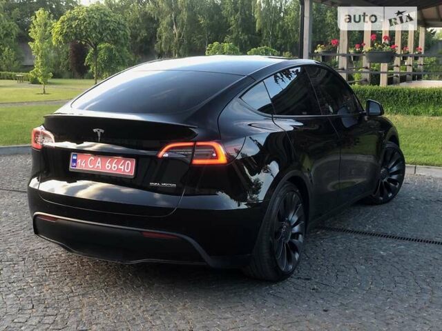 Чорний Тесла Model Y, об'ємом двигуна 0 л та пробігом 73 тис. км за 29499 $, фото 35 на Automoto.ua