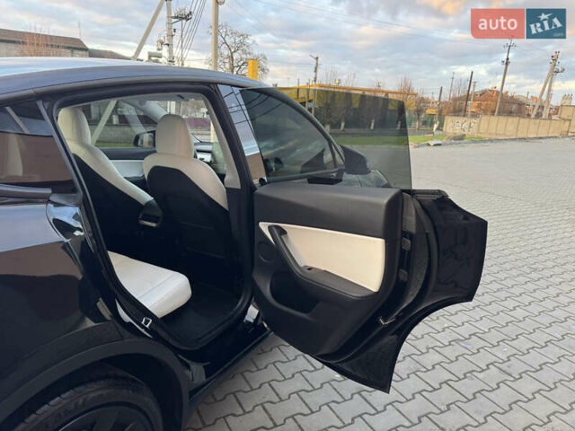 Черный Тесла Model Y, объемом двигателя 0 л и пробегом 149 тыс. км за 20600 $, фото 38 на Automoto.ua
