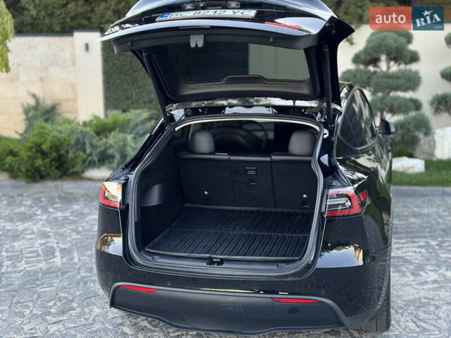 Чорний Тесла Model Y, об'ємом двигуна 0 л та пробігом 110 тис. км за 22799 $, фото 2 на Automoto.ua