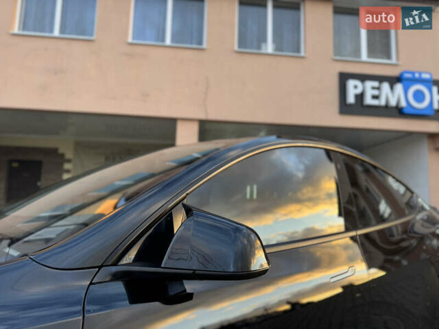 Черный Тесла Model Y, объемом двигателя 0 л и пробегом 149 тыс. км за 20600 $, фото 23 на Automoto.ua