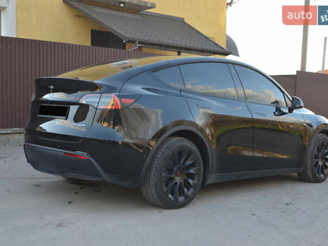 Черный Тесла Model Y, объемом двигателя 0 л и пробегом 77 тыс. км за 21900 $, фото 8 на Automoto.ua