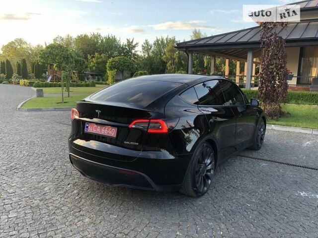Чорний Тесла Model Y, об'ємом двигуна 0 л та пробігом 73 тис. км за 29499 $, фото 110 на Automoto.ua