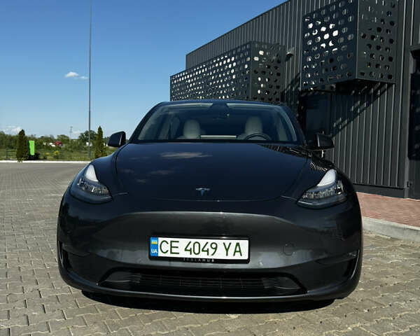 Черный Тесла Model Y, объемом двигателя 0 л и пробегом 90 тыс. км за 25000 $, фото 2 на Automoto.ua