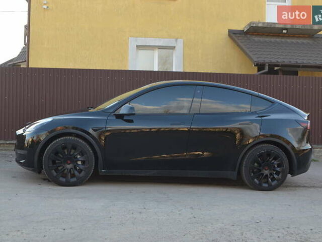 Черный Тесла Model Y, объемом двигателя 0 л и пробегом 77 тыс. км за 21900 $, фото 2 на Automoto.ua