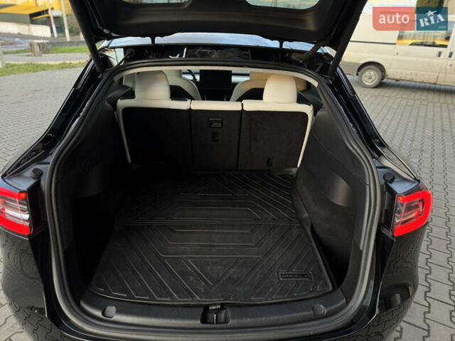 Черный Тесла Model Y, объемом двигателя 0 л и пробегом 149 тыс. км за 20600 $, фото 47 на Automoto.ua