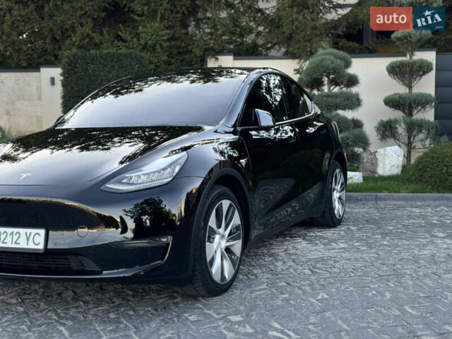 Чорний Тесла Model Y, об'ємом двигуна 0 л та пробігом 110 тис. км за 22999 $, фото 7 на Automoto.ua