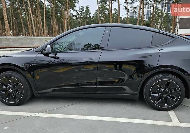 Черный Тесла Model Y, объемом двигателя 0 л и пробегом 136 тыс. км за 23990 $, фото 1 на Automoto.ua