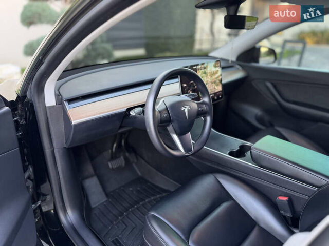 Черный Тесла Model Y, объемом двигателя 0 л и пробегом 113 тыс. км за 21999 $, фото 48 на Automoto.ua