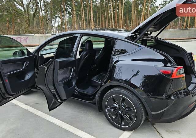 Черный Тесла Model Y, объемом двигателя 0 л и пробегом 136 тыс. км за 23990 $, фото 9 на Automoto.ua