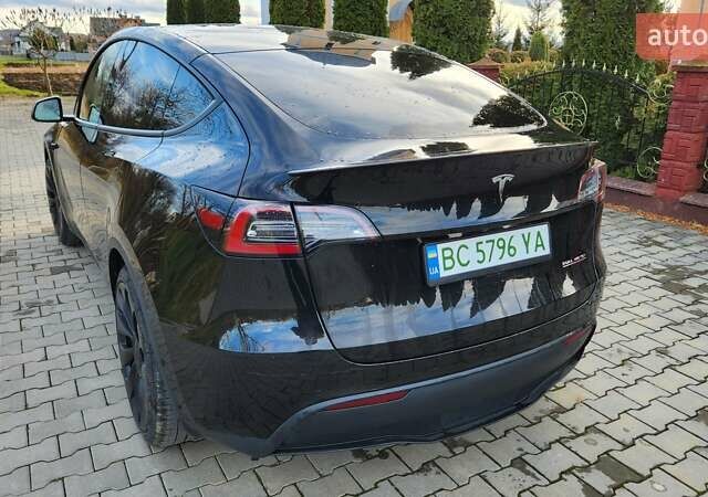 Черный Тесла Model Y, объемом двигателя 0 л и пробегом 86 тыс. км за 24500 $, фото 7 на Automoto.ua