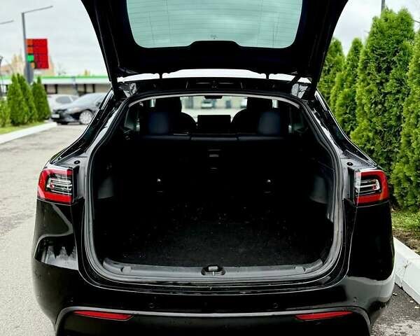Черный Тесла Model Y, объемом двигателя 0 л и пробегом 158 тыс. км за 22860 $, фото 12 на Automoto.ua