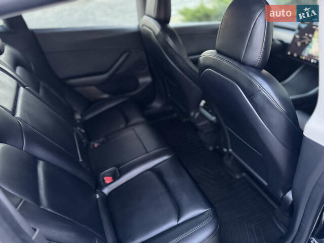 Черный Тесла Model Y, объемом двигателя 0 л и пробегом 113 тыс. км за 21999 $, фото 39 на Automoto.ua