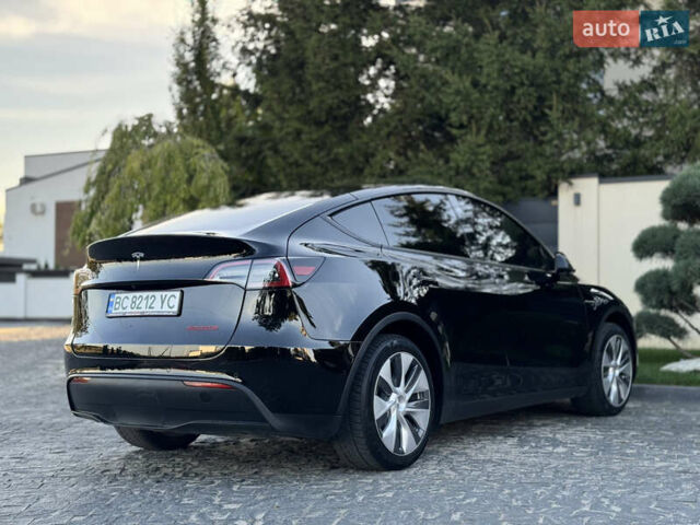 Чорний Тесла Model Y, об'ємом двигуна 0 л та пробігом 110 тис. км за 22999 $, фото 18 на Automoto.ua