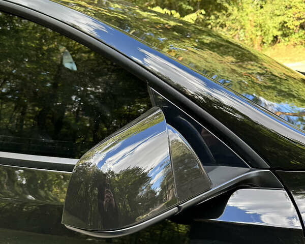 Черный Тесла Model Y, объемом двигателя 0 л и пробегом 143 тыс. км за 22900 $, фото 4 на Automoto.ua