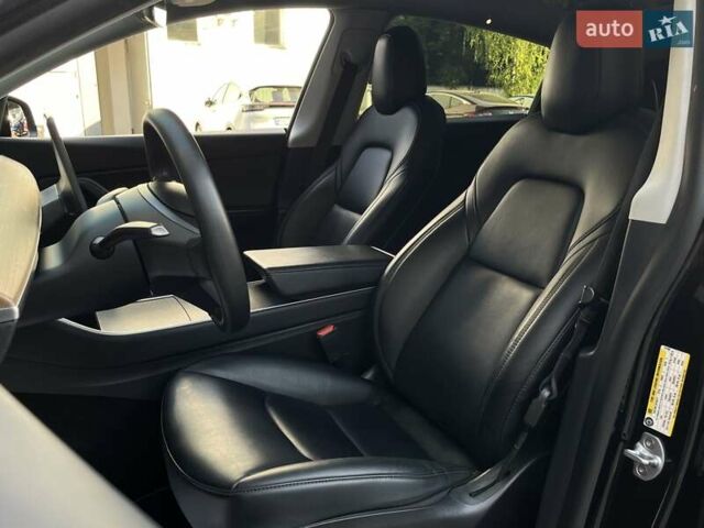 Черный Тесла Model Y, объемом двигателя 0 л и пробегом 136 тыс. км за 24999 $, фото 9 на Automoto.ua