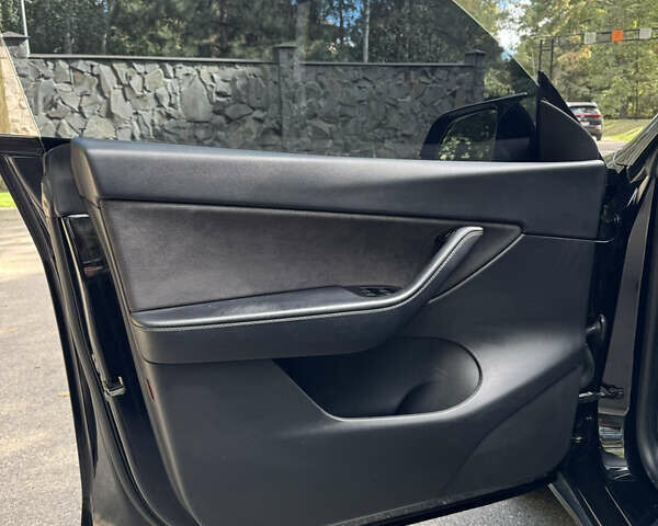 Черный Тесла Model Y, объемом двигателя 0 л и пробегом 143 тыс. км за 22900 $, фото 20 на Automoto.ua