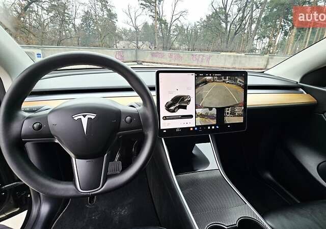 Черный Тесла Model Y, объемом двигателя 0 л и пробегом 136 тыс. км за 23990 $, фото 20 на Automoto.ua