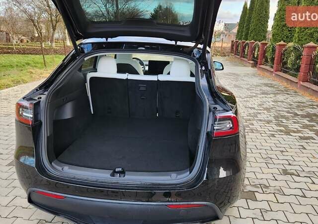 Черный Тесла Model Y, объемом двигателя 0 л и пробегом 86 тыс. км за 24500 $, фото 9 на Automoto.ua