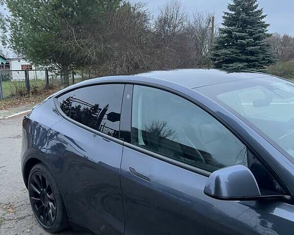 Черный Тесла Model Y, объемом двигателя 0 л и пробегом 66 тыс. км за 24950 $, фото 4 на Automoto.ua