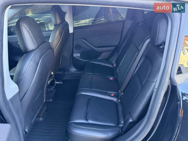 Черный Тесла Model Y, объемом двигателя 0 л и пробегом 68 тыс. км за 28500 $, фото 118 на Automoto.ua