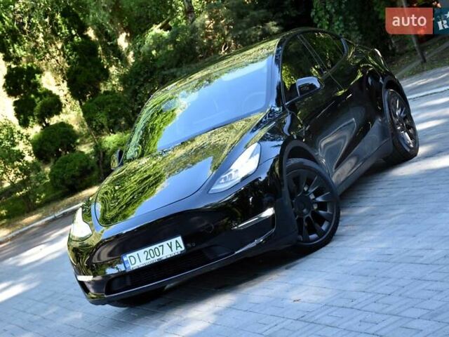 Черный Тесла Model Y, объемом двигателя 0 л и пробегом 82 тыс. км за 24950 $, фото 4 на Automoto.ua
