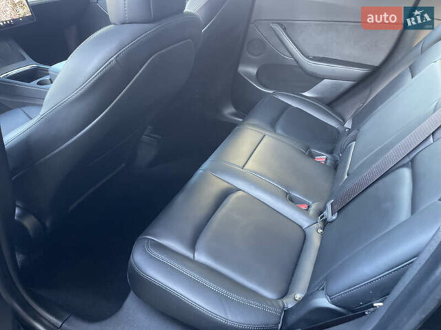 Черный Тесла Model Y, объемом двигателя 0 л и пробегом 77 тыс. км за 22700 $, фото 12 на Automoto.ua