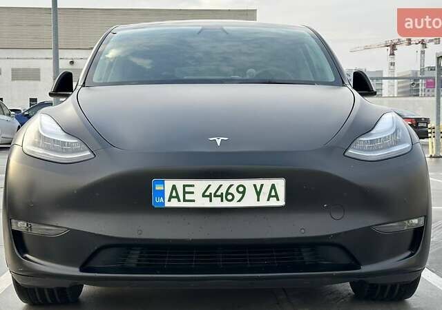 Чорний Тесла Model Y, об'ємом двигуна 0 л та пробігом 100 тис. км за 27999 $, фото 1 на Automoto.ua
