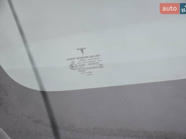 Черный Тесла Model Y, объемом двигателя 0 л и пробегом 73 тыс. км за 25950 $, фото 29 на Automoto.ua