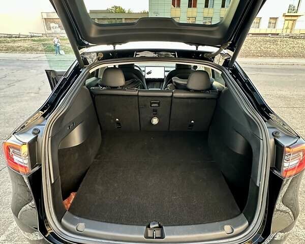 Чорний Тесла Model Y, об'ємом двигуна 0 л та пробігом 141 тис. км за 24900 $, фото 16 на Automoto.ua