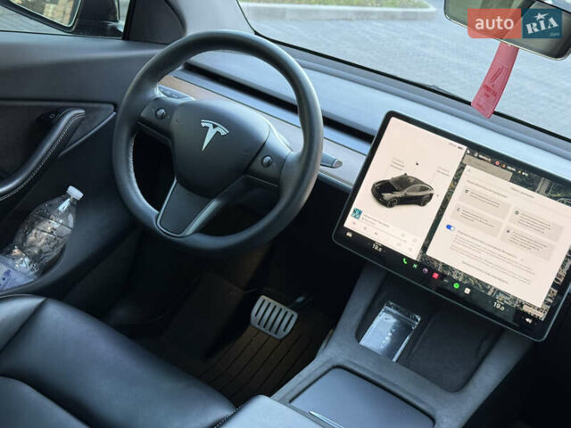 Черный Тесла Model Y, объемом двигателя 0 л и пробегом 68 тыс. км за 28500 $, фото 121 на Automoto.ua
