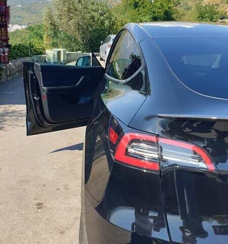 Черный Тесла Model Y, объемом двигателя 0 л и пробегом 115 тыс. км за 25200 $, фото 37 на Automoto.ua