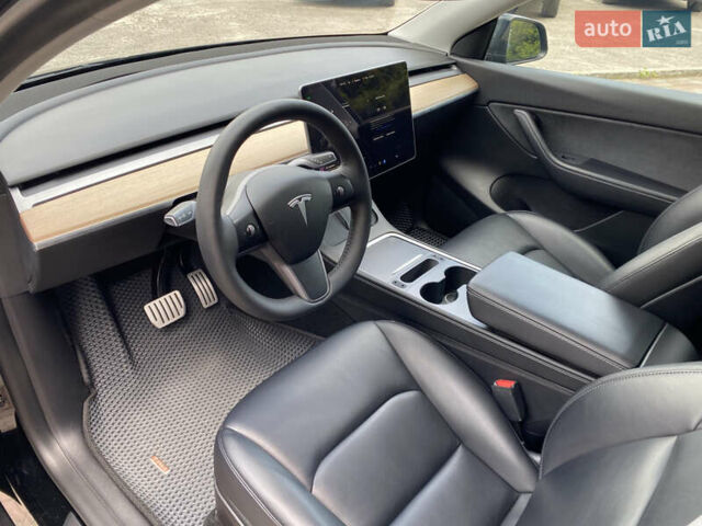 Черный Тесла Model Y, объемом двигателя 0 л и пробегом 74 тыс. км за 27699 $, фото 14 на Automoto.ua