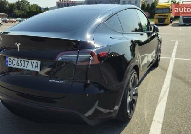 Черный Тесла Model Y, объемом двигателя 0 л и пробегом 99 тыс. км за 27000 $, фото 5 на Automoto.ua
