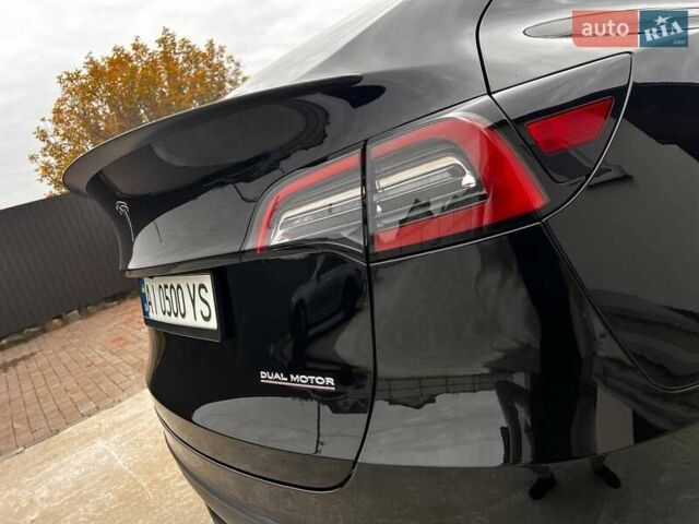 Чорний Тесла Model Y, об'ємом двигуна 0 л та пробігом 73 тис. км за 27999 $, фото 13 на Automoto.ua