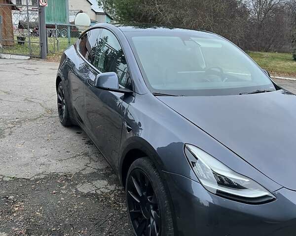 Черный Тесла Model Y, объемом двигателя 0 л и пробегом 66 тыс. км за 24950 $, фото 1 на Automoto.ua