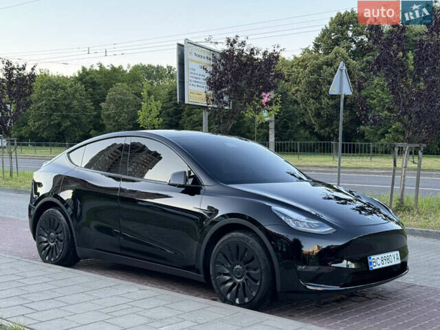Черный Тесла Model Y, объемом двигателя 0 л и пробегом 102 тыс. км за 24999 $, фото 2 на Automoto.ua