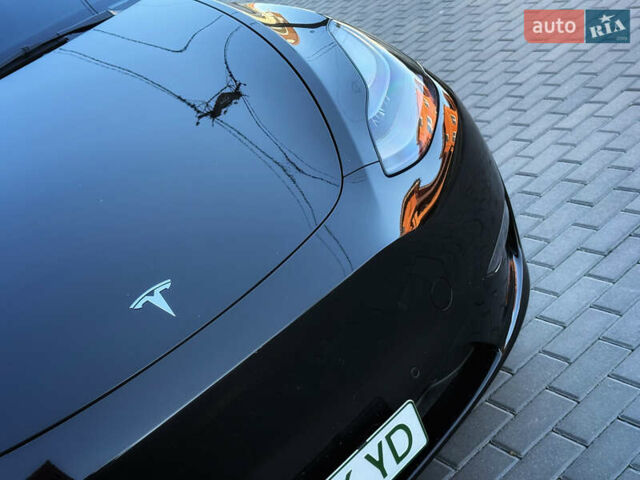 Черный Тесла Model Y, объемом двигателя 0 л и пробегом 68 тыс. км за 28500 $, фото 140 на Automoto.ua