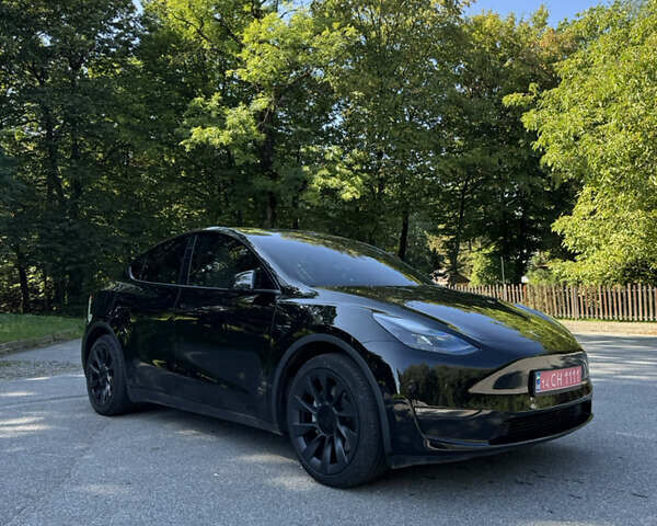 Черный Тесла Model Y, объемом двигателя 0 л и пробегом 113 тыс. км за 22222 $, фото 1 на Automoto.ua