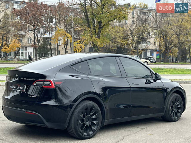 Черный Тесла Model Y, объемом двигателя 0 л и пробегом 5 тыс. км за 24999 $, фото 4 на Automoto.ua