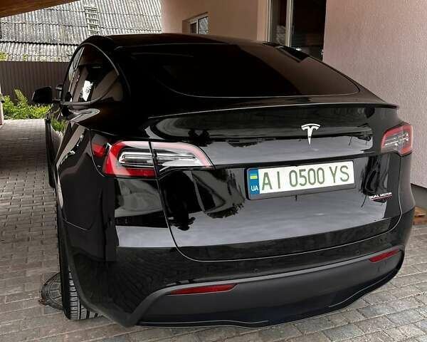 Чорний Тесла Model Y, об'ємом двигуна 0 л та пробігом 73 тис. км за 27999 $, фото 10 на Automoto.ua